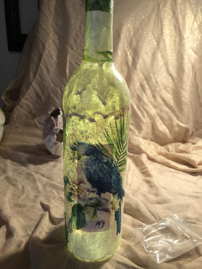 Tropical Bird on a Bottle